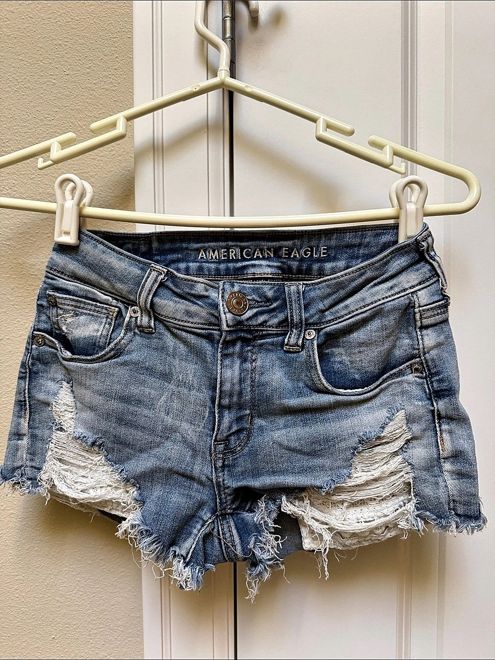 American Eagle Distressed Jean Shorts in Blue